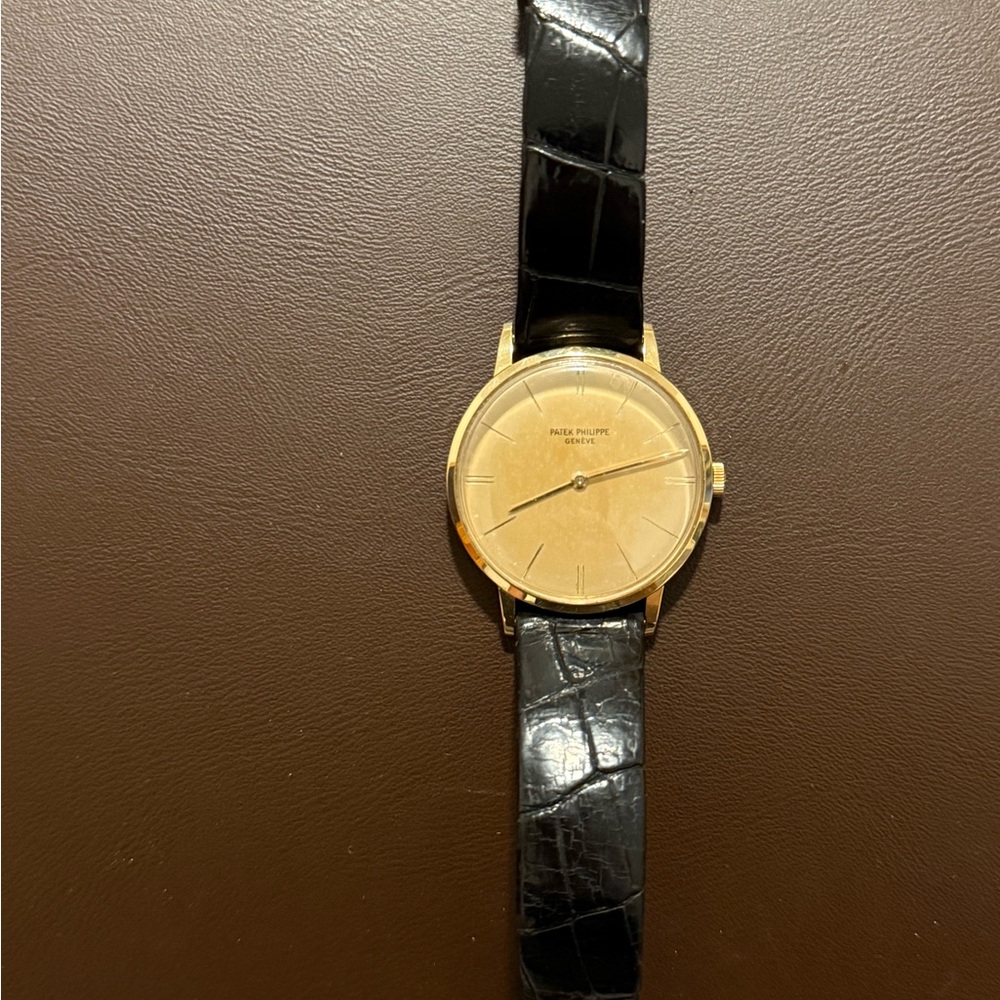 Patek Philippe Gold and Black Leather Watch